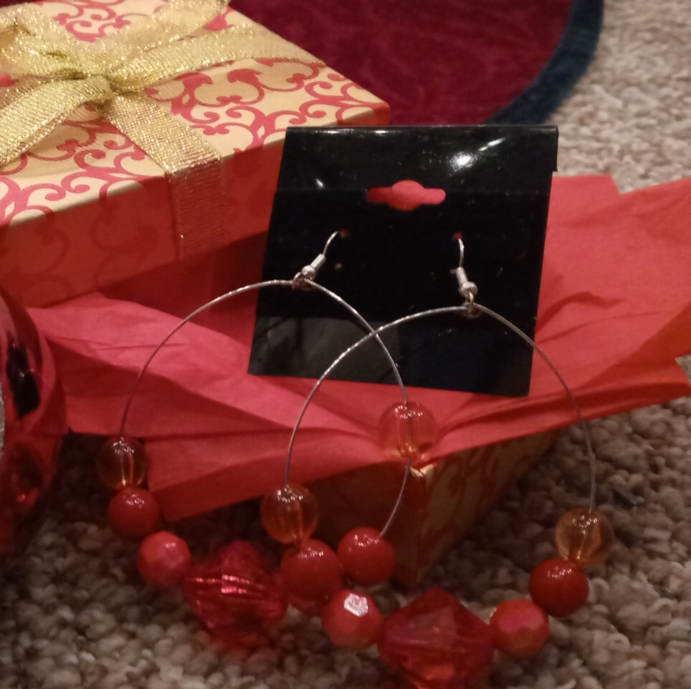 Red hoop earrings
